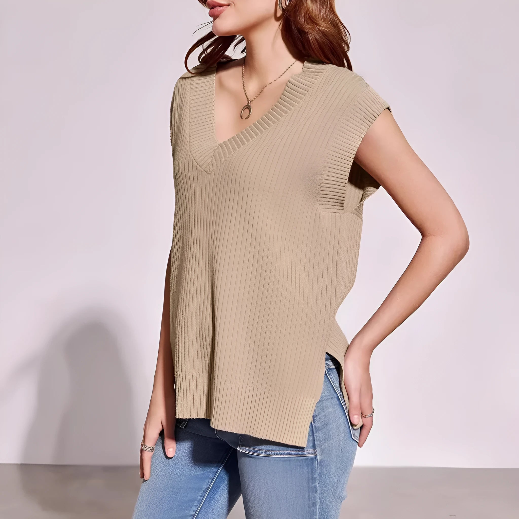 Women's camel and white V-neck sleeveless pullover vest in loose fit with striped plaid patterns