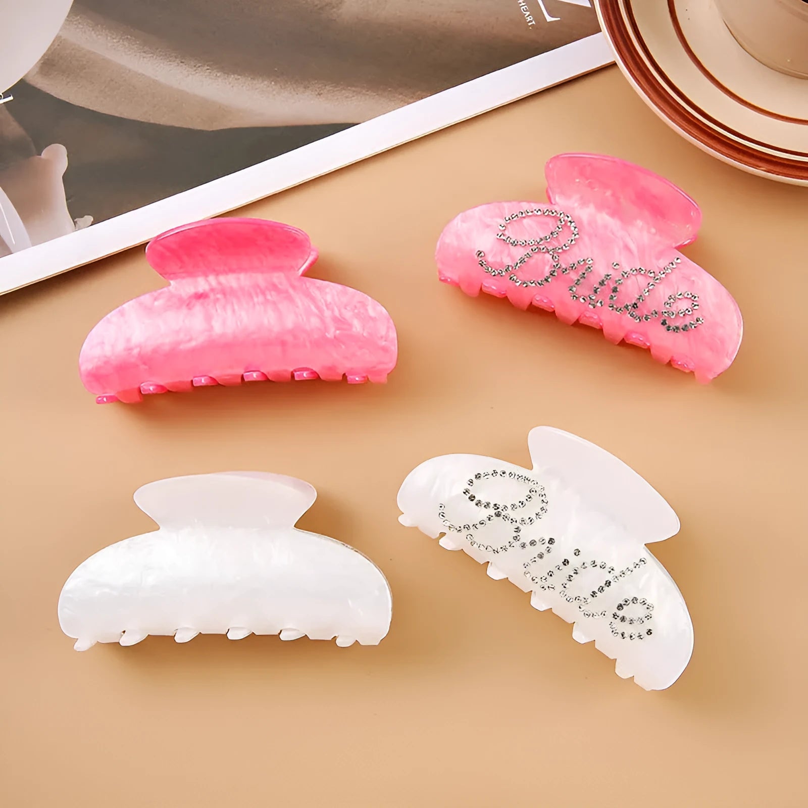 Acrylic hair clip with spot drill decoration in pink or white, 10cm long.