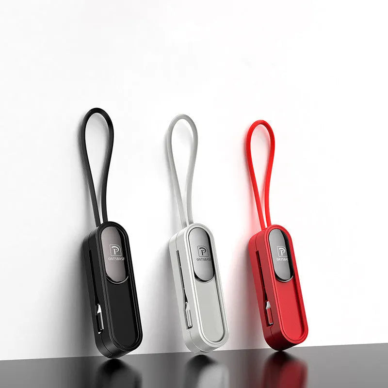 Black magnetic three-in-one USB charging cable with 0.4 metre length shown alongside white and red colour options