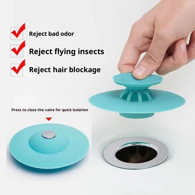 UFO-style silicone press sink drain cover in blue on a white basin, modern minimalist design