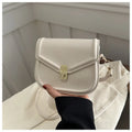 Niche texture shoulder messenger bag in soft PU leather with clamshell opening and horizontal square shape