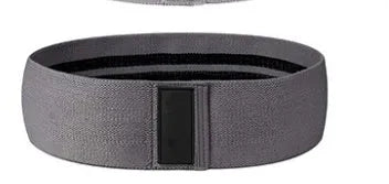 Set of three fabric resistance bands in lake blue, pink, and purple with a mesh storage bag.