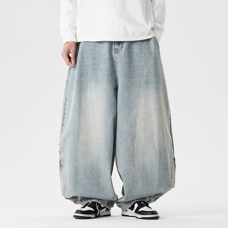 Men's plus size wide leg casual jeans in dark blue denim with straight leg opening