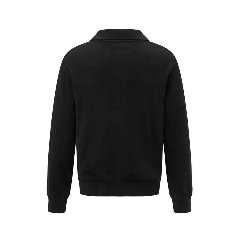 Loose fit black acrylic fibre blend pullover sweater on a hanger.