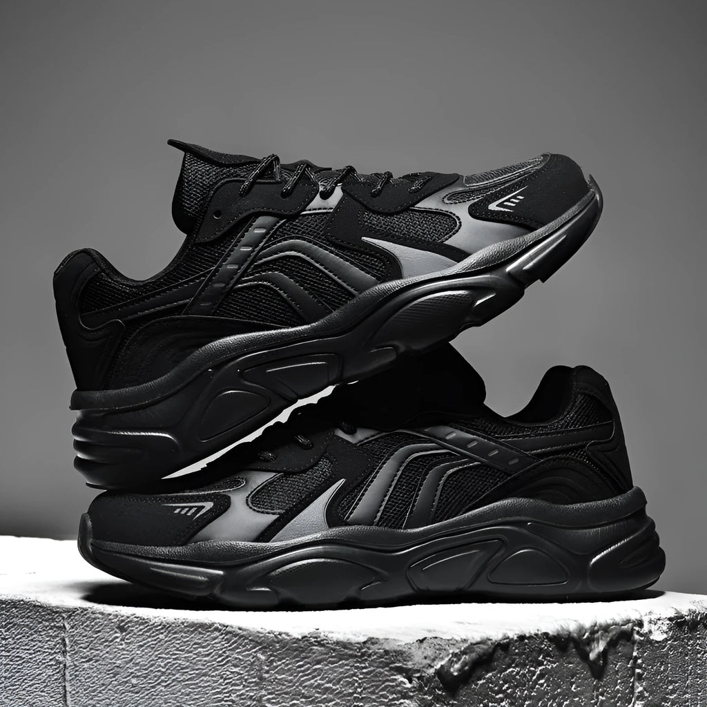Men's beige and black collapse flat casual sneakers shown in a folded and unfolded state.