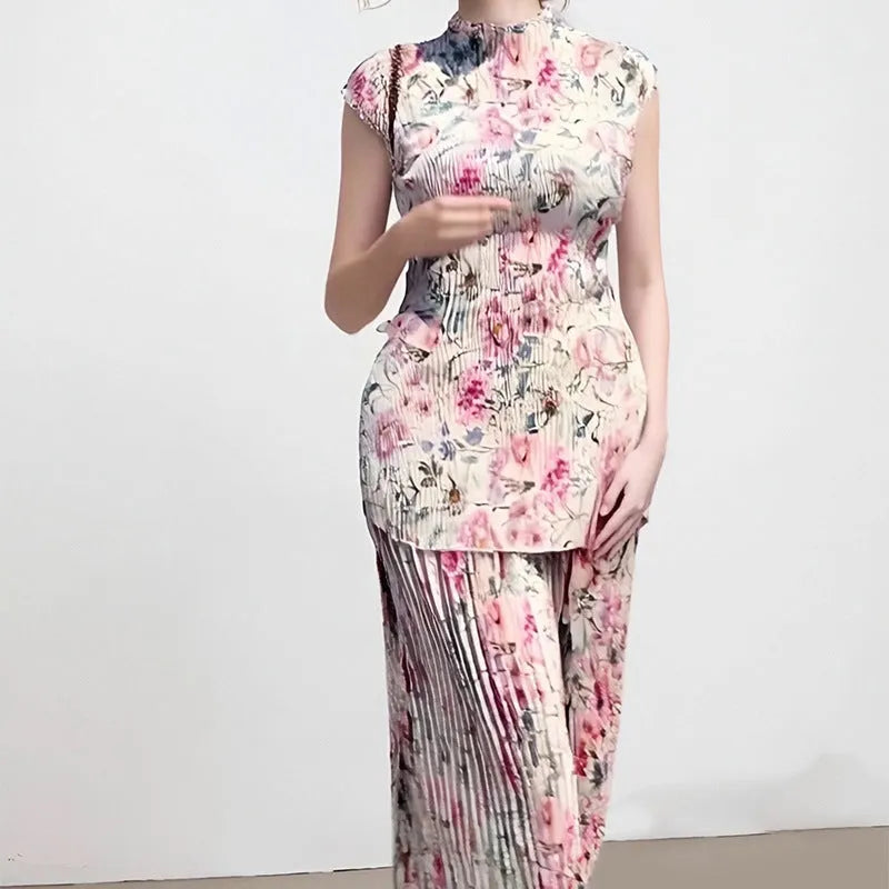 Long sleeve printed chiffon dress and top set on a hanger, showing high waist design.