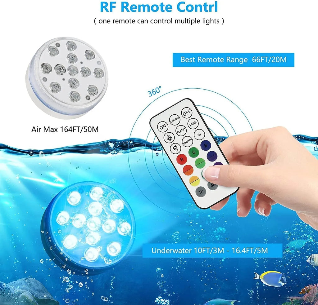 Remote control and a small cylindrical IP68 waterproof diving light with colour changing LEDs for aquariums.