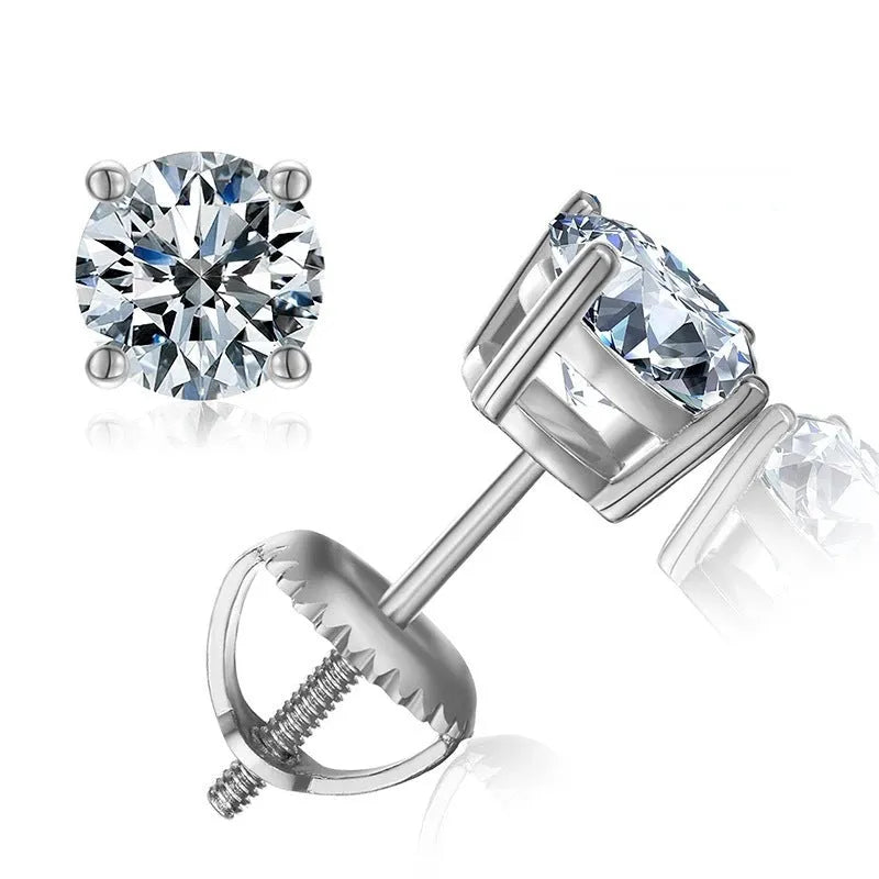 Close-up of silver geometric moissanite stud earrings with screw claw setting on a black card.