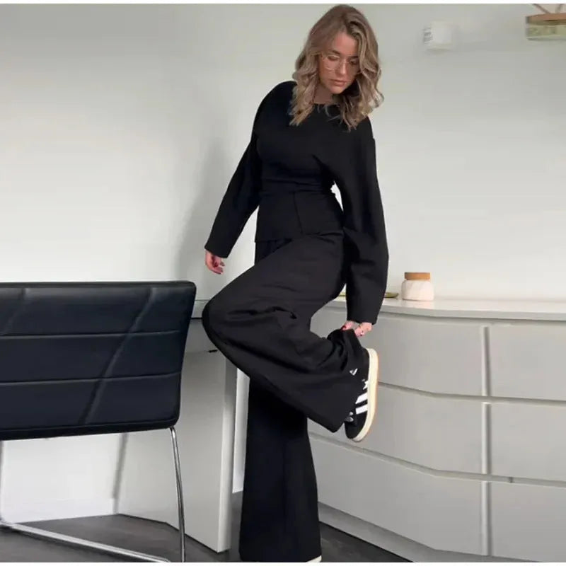 Women's polar fleece suit set showing O-neck pleated top and wide leg trousers in coordinating colours