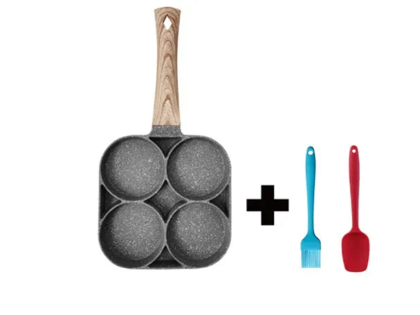 Non-stick four-hole frying pan with medical stone coating on a gas hob cooking eggs and pancakes