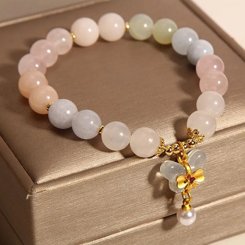 Colourful morganite bracelet with crystal butterfly pendant on silver chain