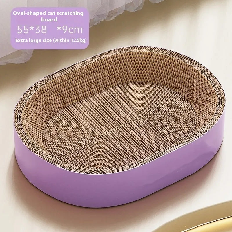 Green oval corrugated paper cat scratch board with a hollow centre forming a nest.