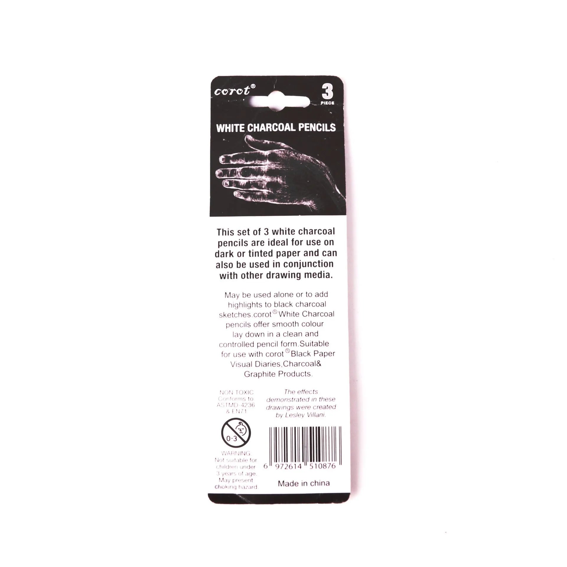 Set of three white charcoal drawing pencils with wooden barrels for sketching on dark paper.