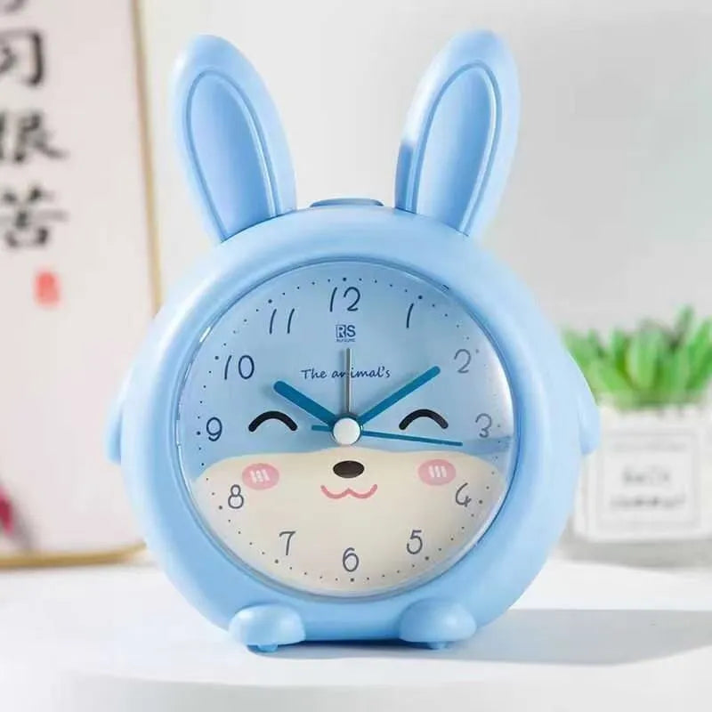 Pink and blue cartoon children's alarm clock with mute function and night light.