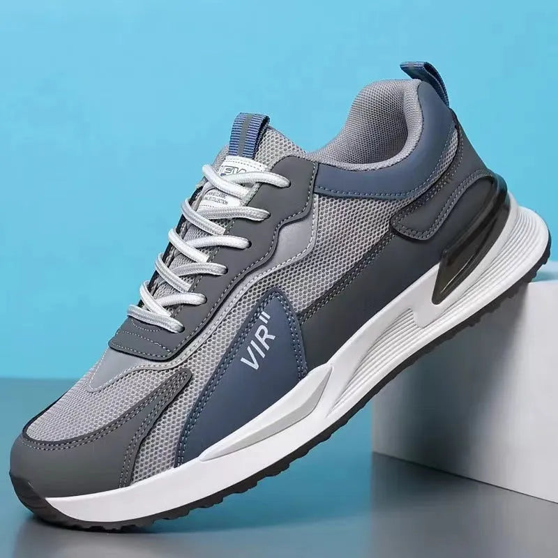 Men's colour block mesh sneakers in black, grey, or white on a plain background