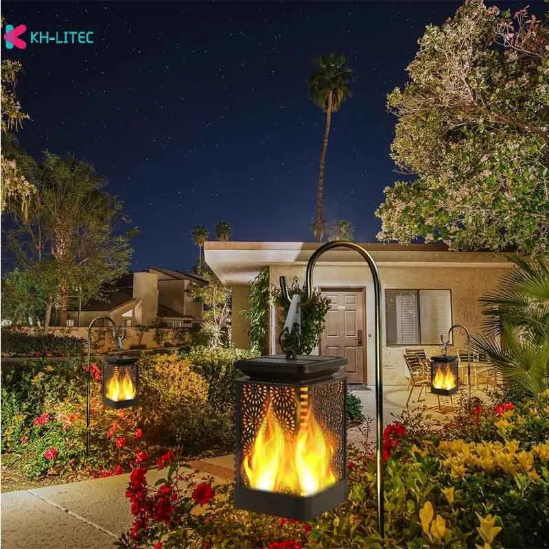 Black solar hanging flame torch LED light for outdoor garden and patio decoration.