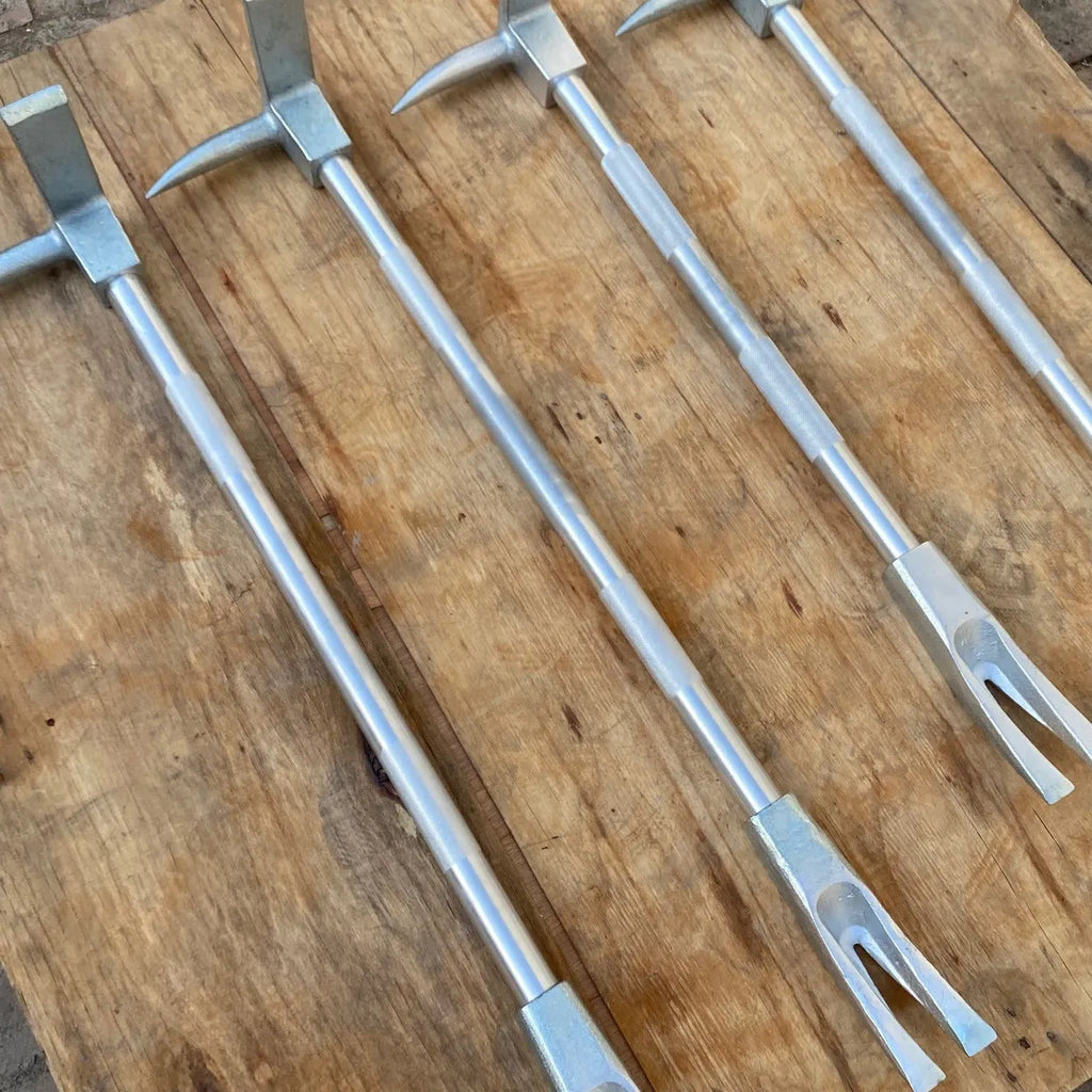 Silver carbon steel wrecking bar 24 inches with iron collar on a dark surface