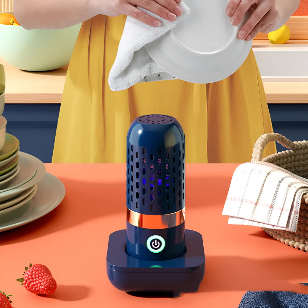 Blue capsule fruit and vegetable purifier with mechanical button and USB charging, placed in water