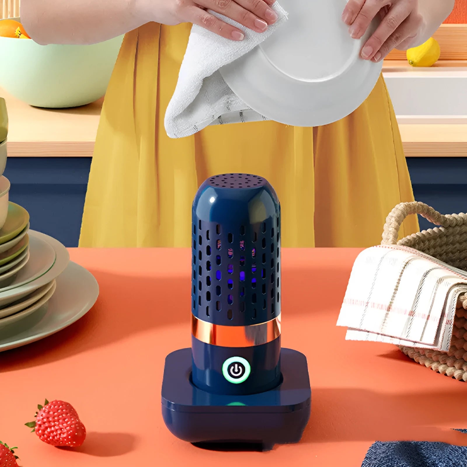 Blue capsule fruit and vegetable purifier with mechanical button and USB charging, placed in water