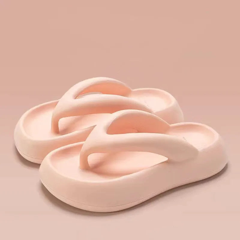 Solid colour EVA flip-flops with a thick sole and a decorative bow on the thong strap.