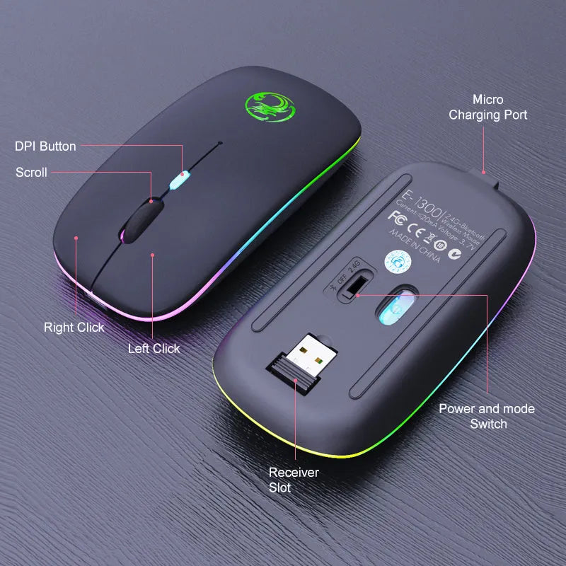 Black and white wireless mouse with silent buttons and luminous charging scroll wheel on a desk.