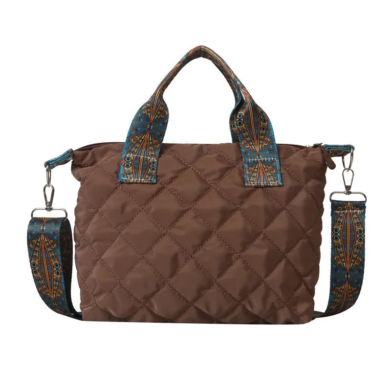 A soft Oxford cloth messenger bag in a horizontal square shape with a single shoulder strap, shown in one of five available colours.