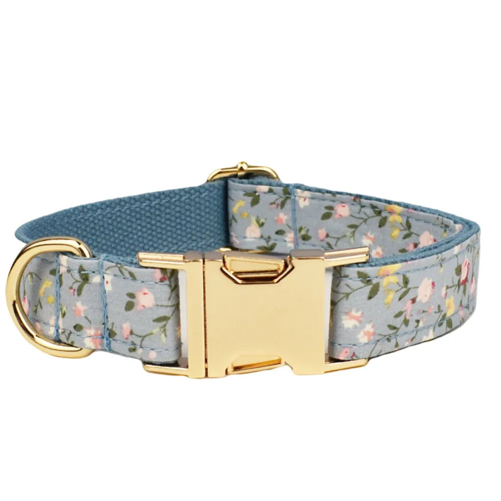 Blue floral polyester cotton dog collar set with matching leash, vest, bow and accessories