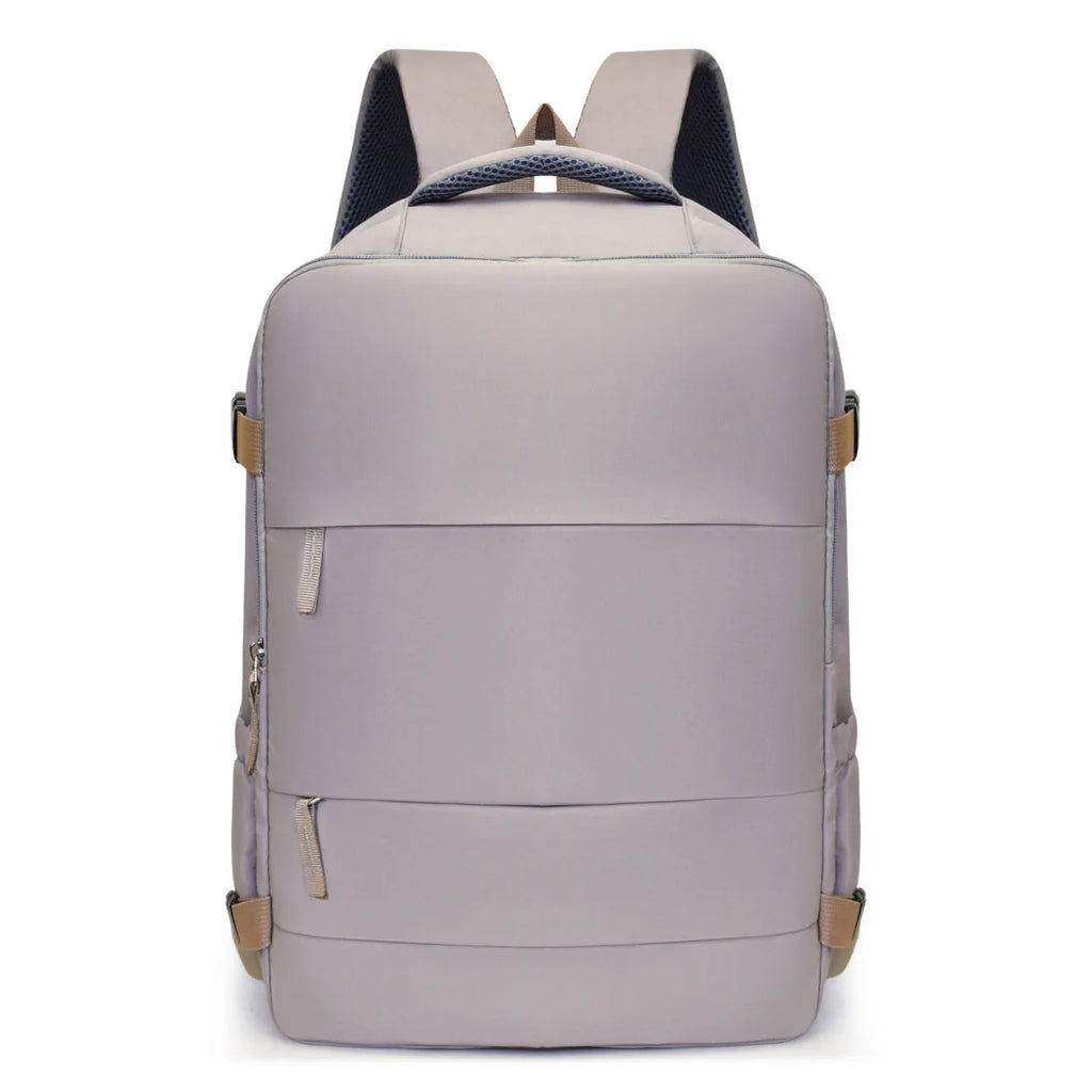 Women's lightweight waterproof solid colour travel backpack in grey with curved shoulder straps and stitching detail