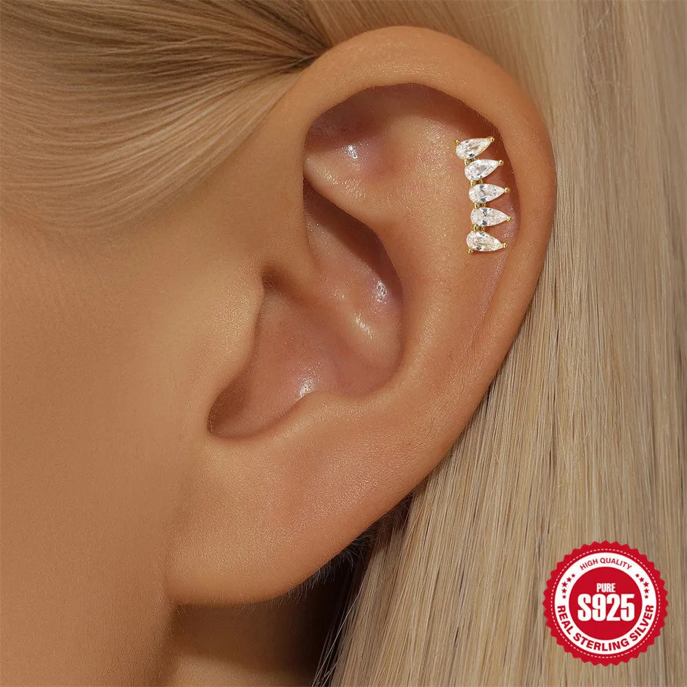 S925 sterling silver moon-shaped earring with embedded gold-tone star, geometric unisex design.