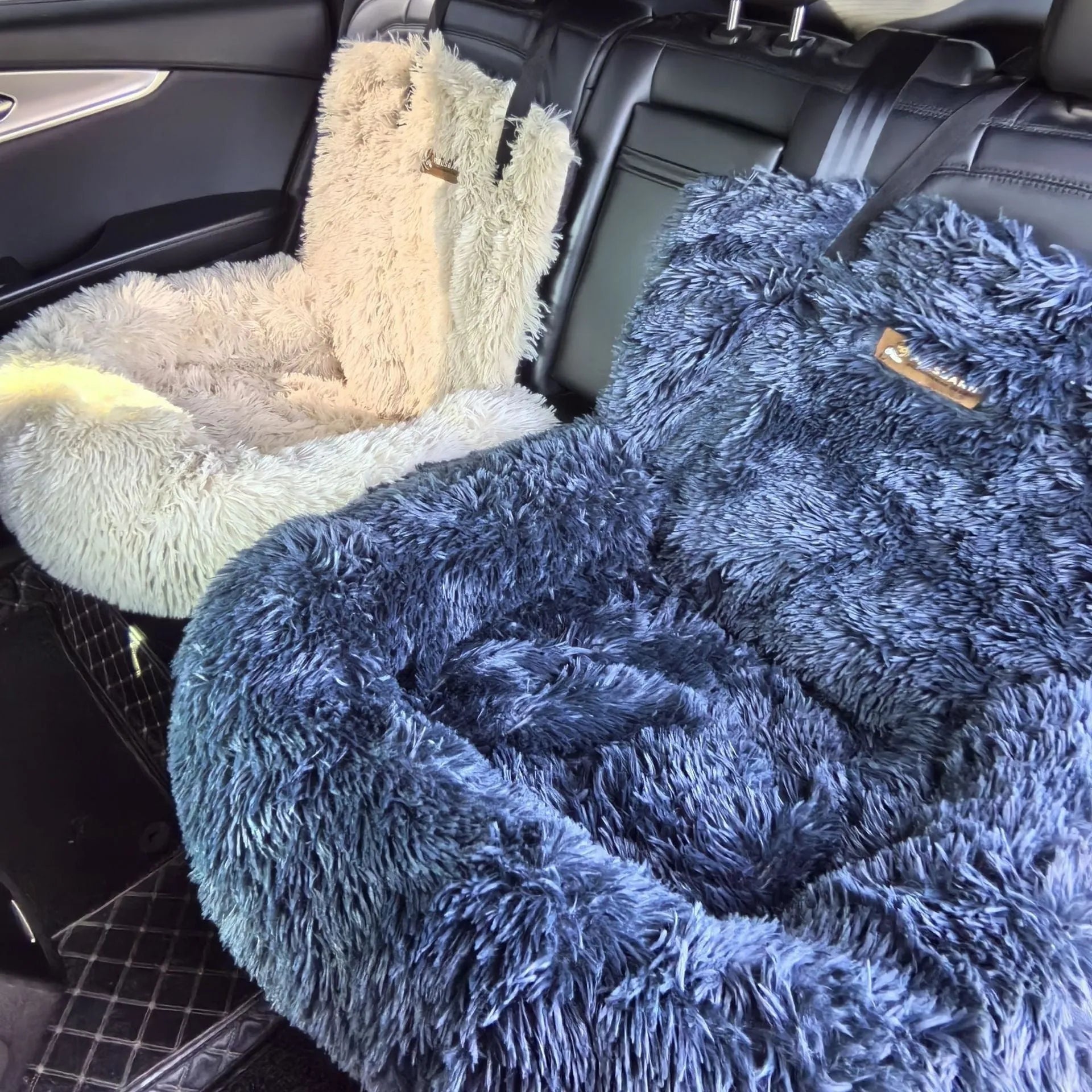 Dark grey thick cloth pet mat placed on a car seat, showing its size and texture for vehicle travel.