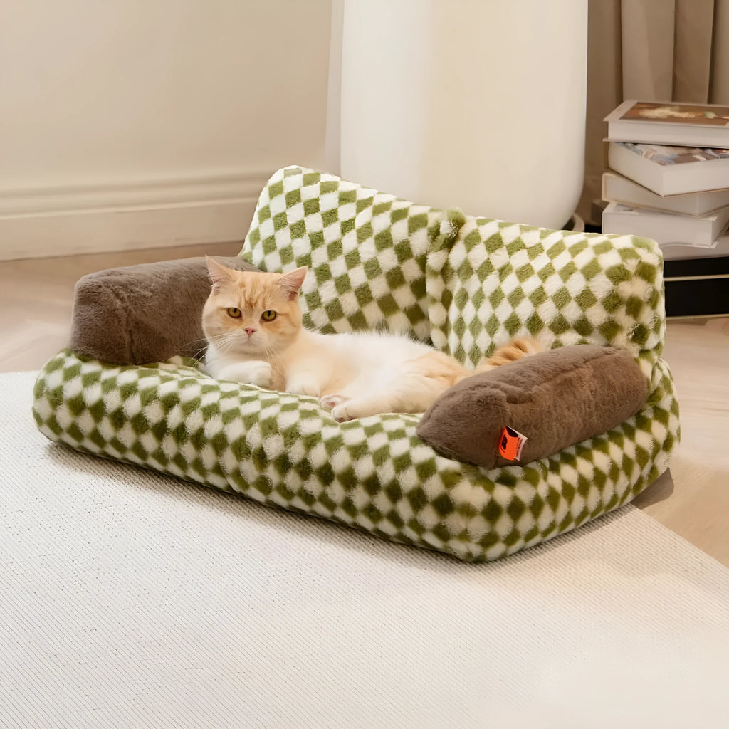 Fluffy cat couch bed in black and white with raised sides and non-slip base for cats and small dogs