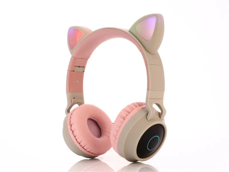 Pink cartoon cat ear wireless Bluetooth gaming headset showing head-mounted design with bilateral ear cups