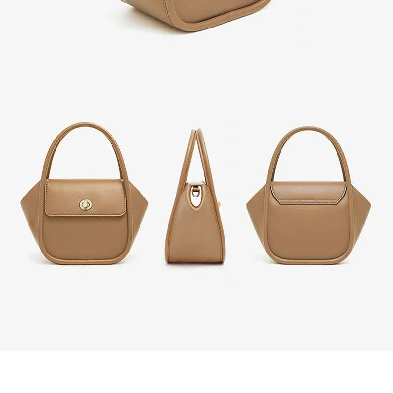 Women's leather wing tote bag with cross-body strap and latch closure in various colour options