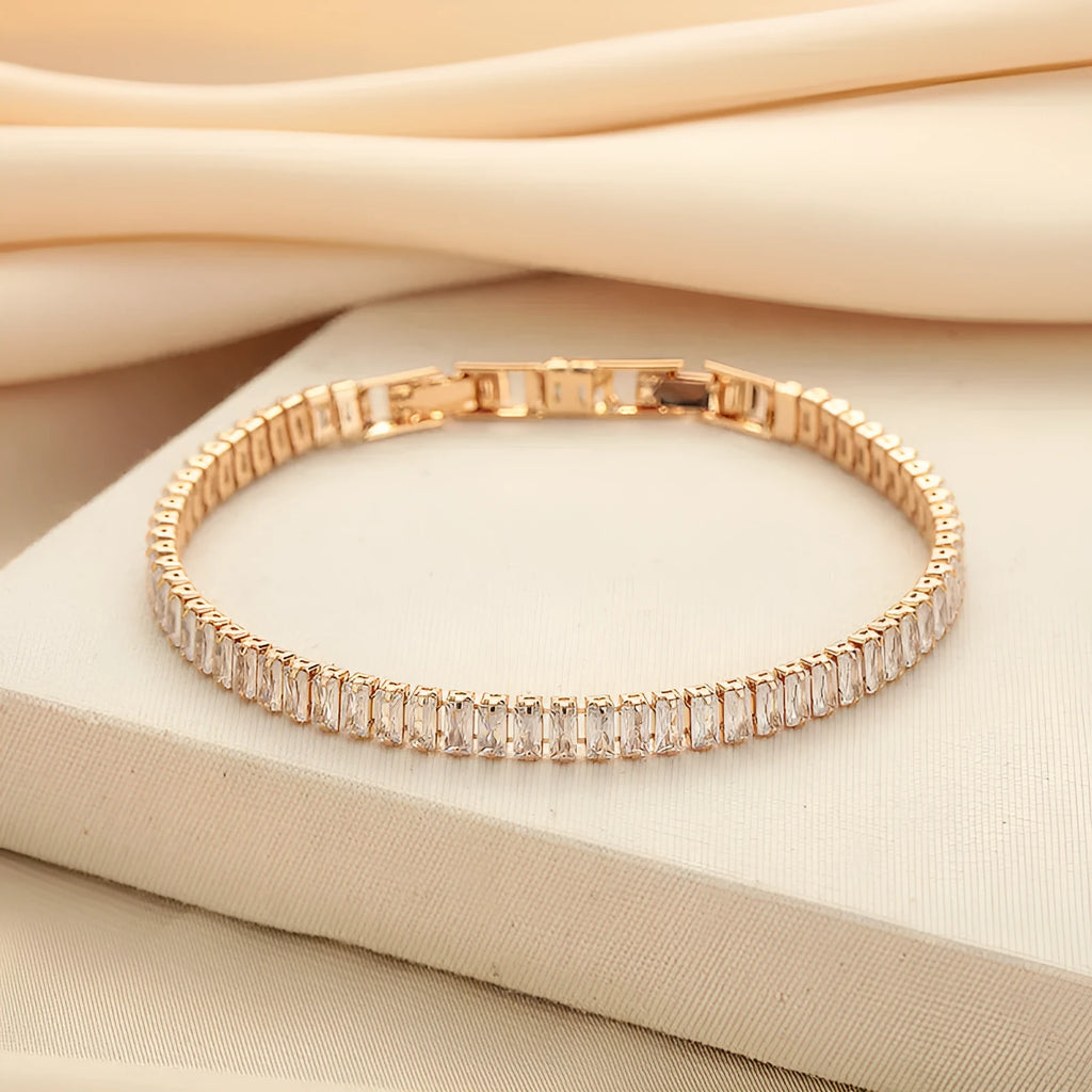 Geometric brass bracelet with quadrilateral full diamond zircon inlay in champagne gold colour
