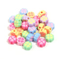 Assortment of frosted acrylic four-leaf clover shaped beads in rose red, pink, yellow, green, blue, and purple colours.