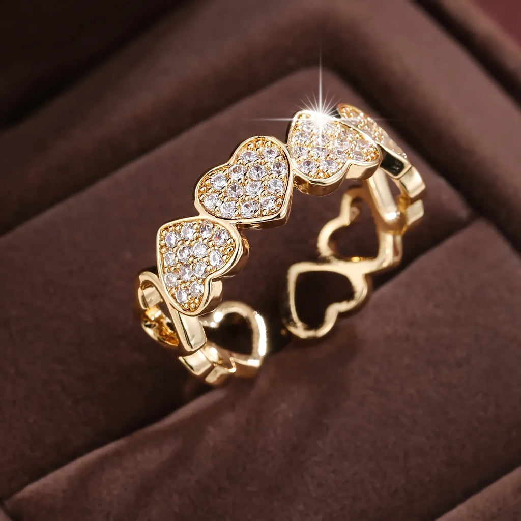 Adjustable geometric love heart couples ring in gold colour on small finger