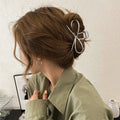 Korean style bow barrettes for women in gold and silver alloy metal with secure back head grip