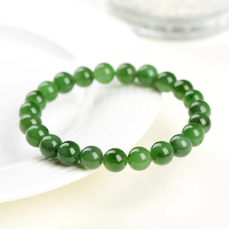 Polished Hetian jade jasper ball bracelet in five bead size options from 4mm to 12.8mm