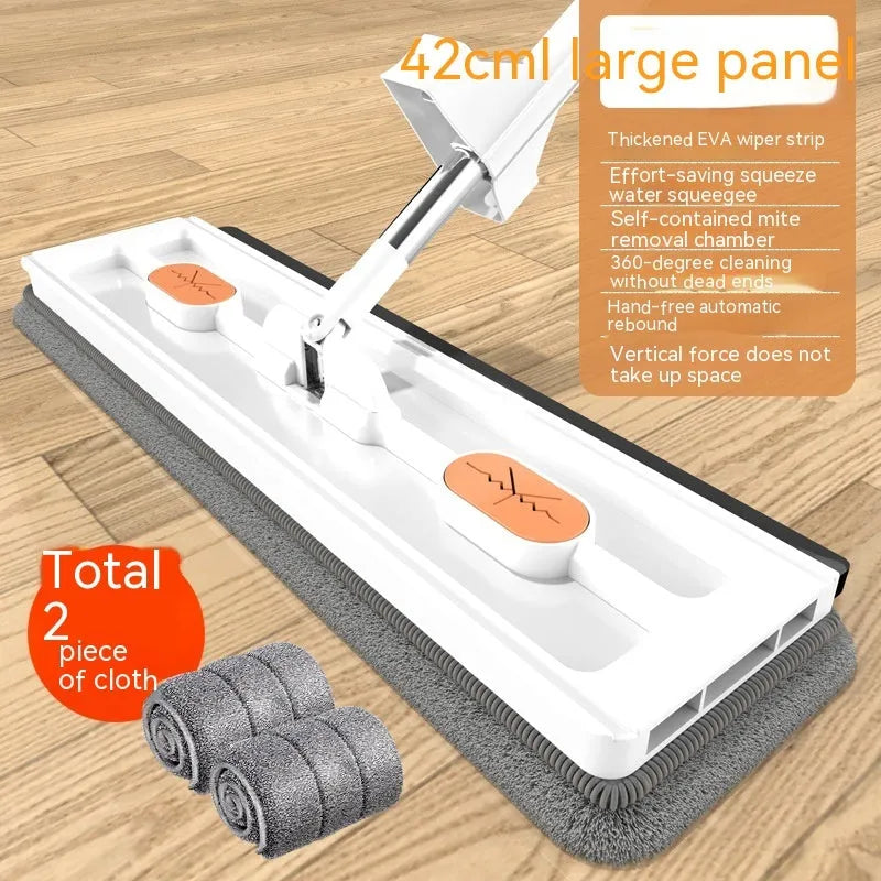 Large flat mop with long stainless steel handle and blue/white cloths on a hard floor.
