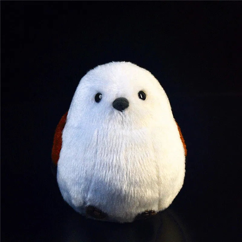 Plush bird decompression ball toy in Kingfisher design, 14cm height, on a desk