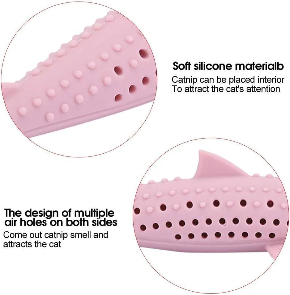 Green silicone fish-shaped chew toy for cats on a white background