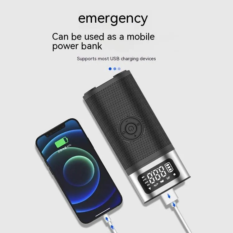 Black portable wireless car air pump with a digital display, inflation hose, and a set of nozzles on a black background.