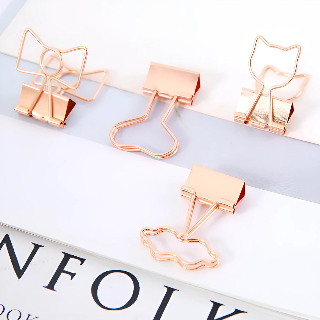 Gold plated metal office clip with decorative long tail design showing flamingo, love, clouds, cat, and cactus motif options