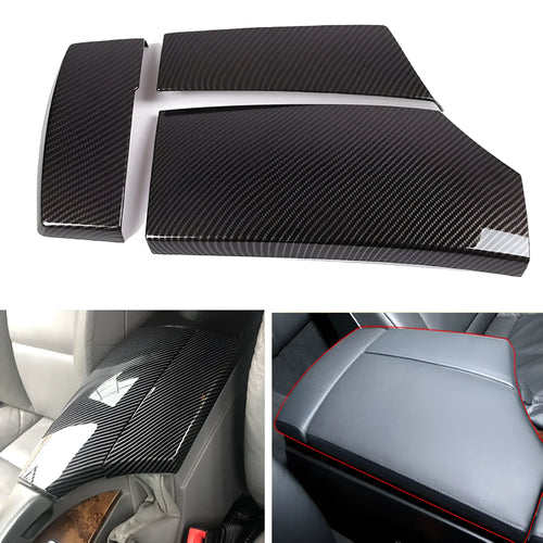 Three black ABS armrest protective covers with carbon fibre pattern for car centre console