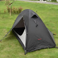 Single person lightweight camping tent with aluminium poles shown in a red colour option, fully expanded.