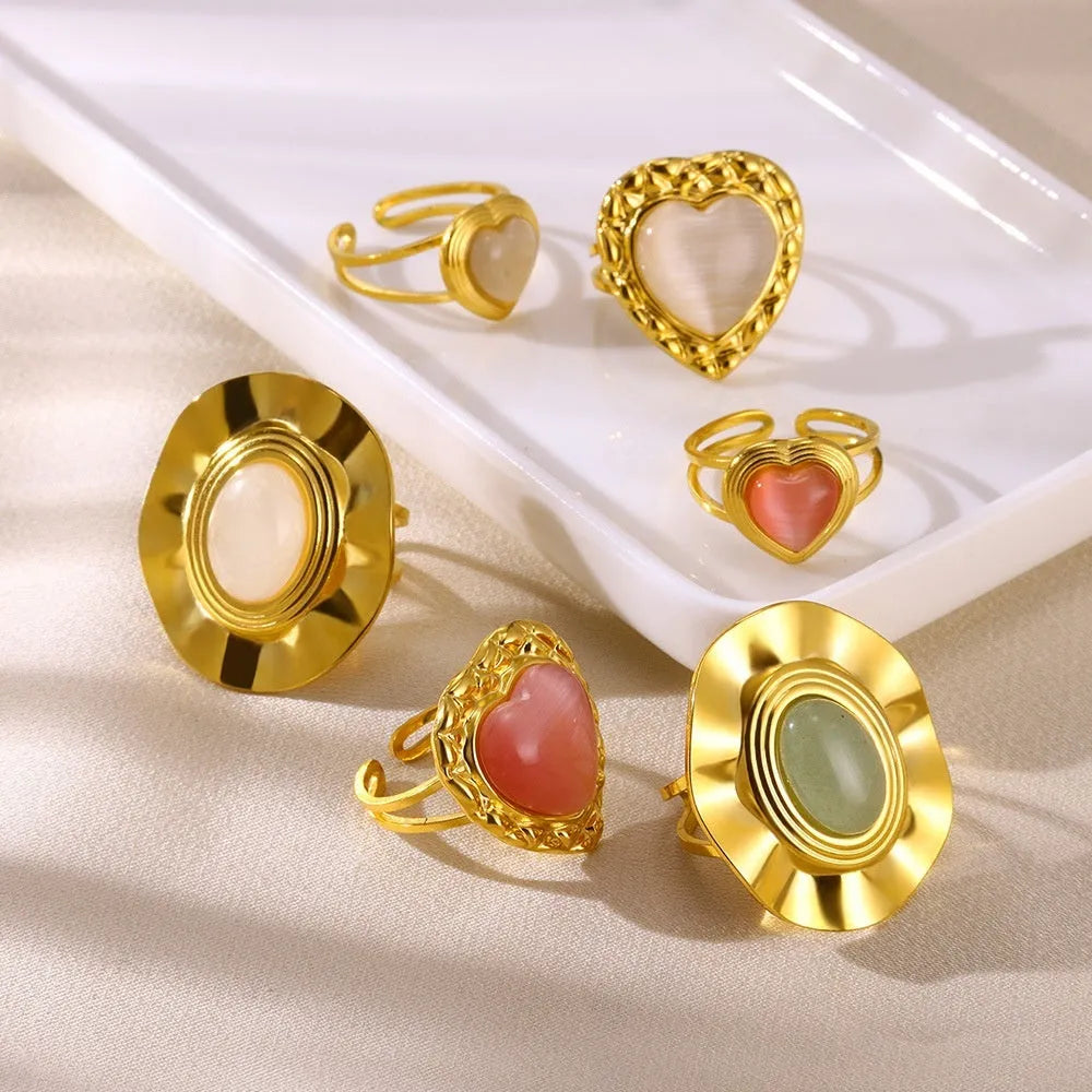 Retro stainless steel heart-shaped pendant ring with open band and asymmetric wave design