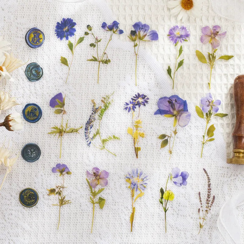 Pack of 40 decorative dried flower design sticker sheets in eight colours including purple, blue, and orange.