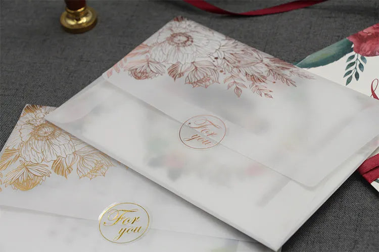 Gold bronzed sulfuric acid paper invitation card with matte finish measuring 12.5 by 17.6 centimetres