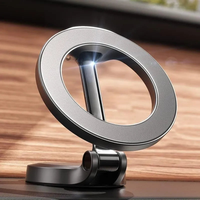 All-metal magnetic car phone mount with foldable design on vehicle dashboard