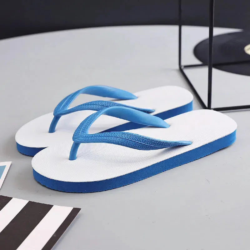Casual rubber flip-flops available in four colours with fish label detailing